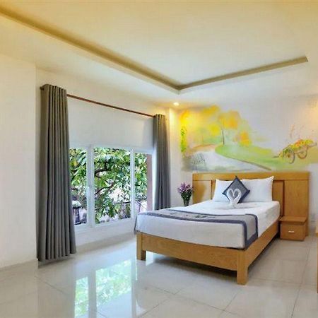 U And Me Hotel Tan Phong Extérieur photo
